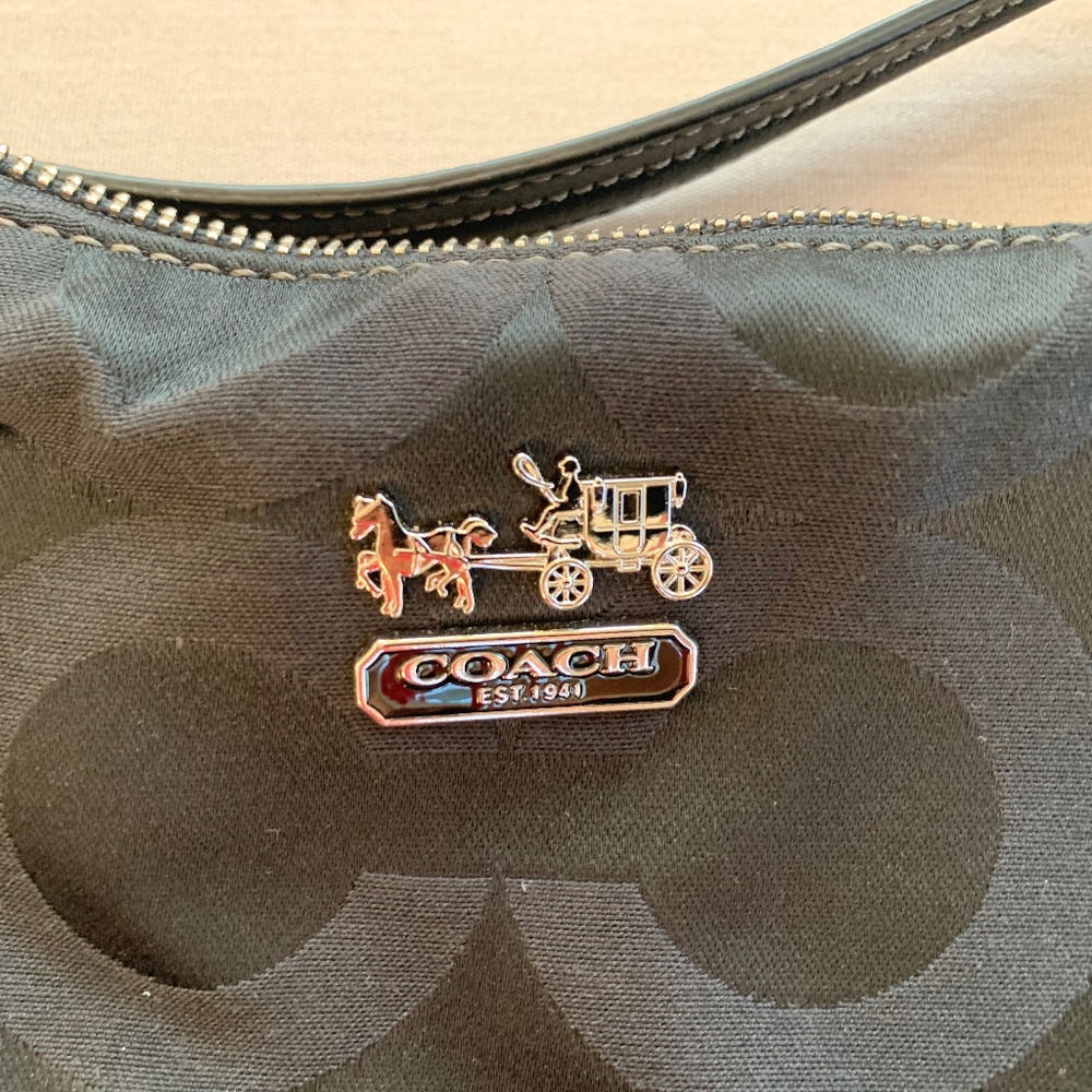 Coach purse- black with purple interior